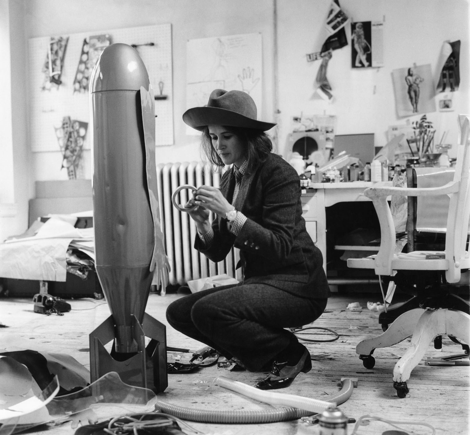 Kiki Kogelnik working on one of her Bomb sculptures in her studio in New York, 1965.